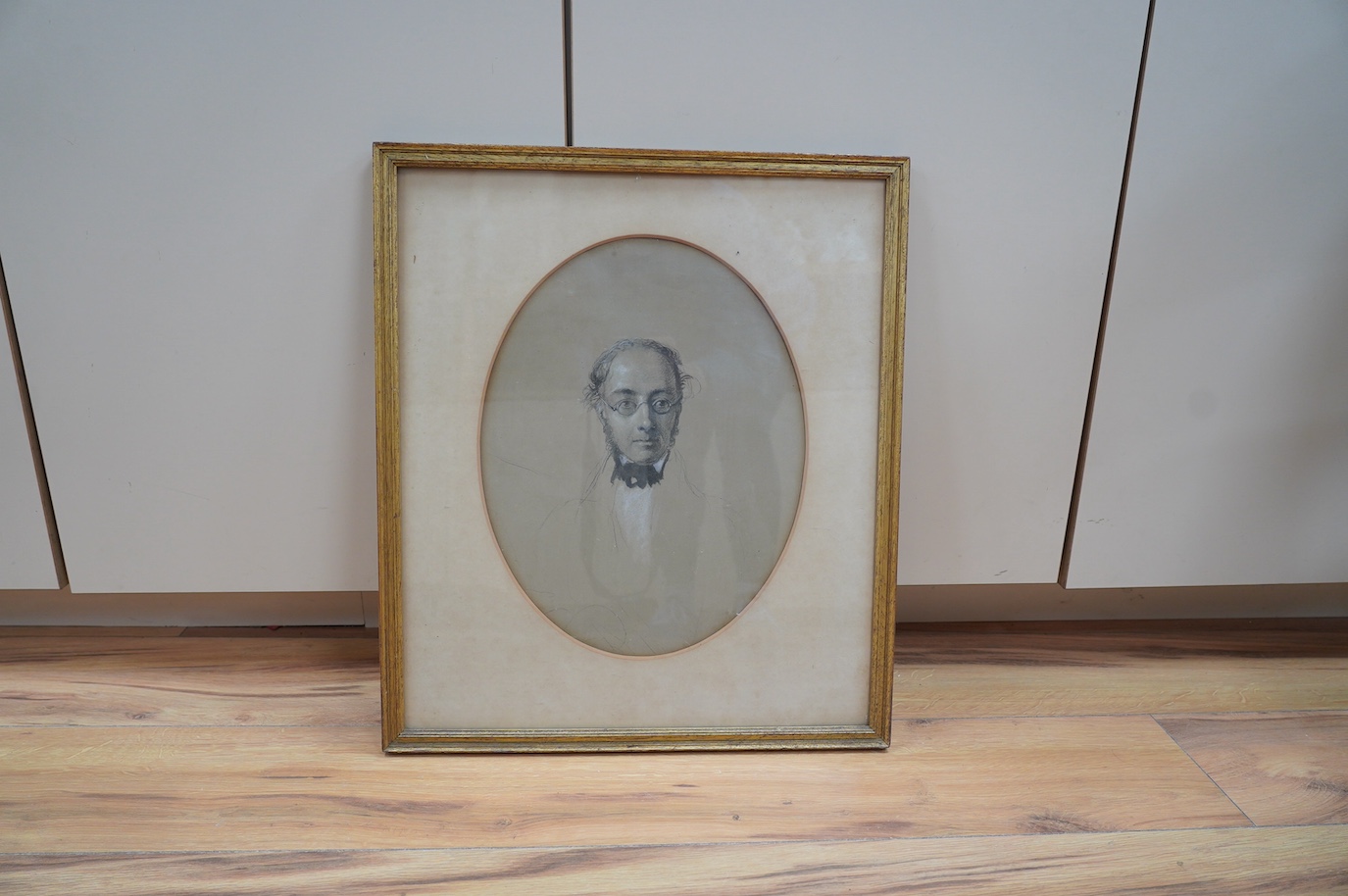 Late 19th century, oval heightened charcoal, Portrait of a gentleman, unsigned, 37 x 27cm. Condition - fair